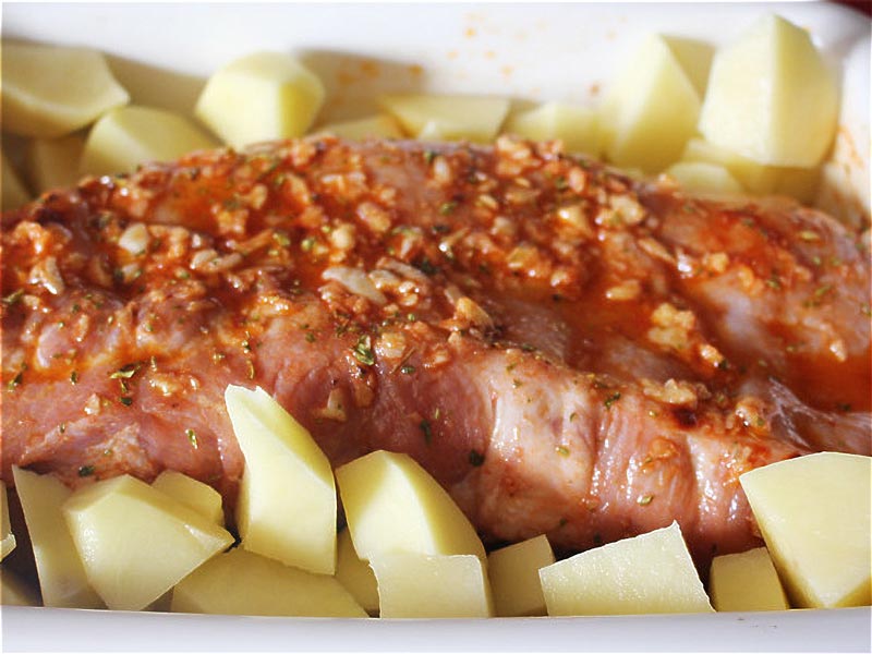 costillas adobadas al horno con patatas