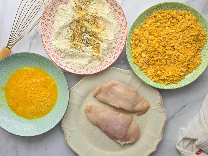 ingredientes filetes de pechuga de pollo rebozados en cereales - Pechuga de pollo crujiente en freidora de aire, jugosa, fácil, y saludable